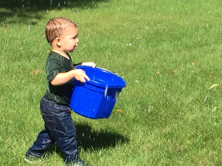 Getting sprayed with the hose by daddy3